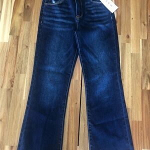 High-Rise Flare Jeans in Dark Blue by AGOLDE. NWT